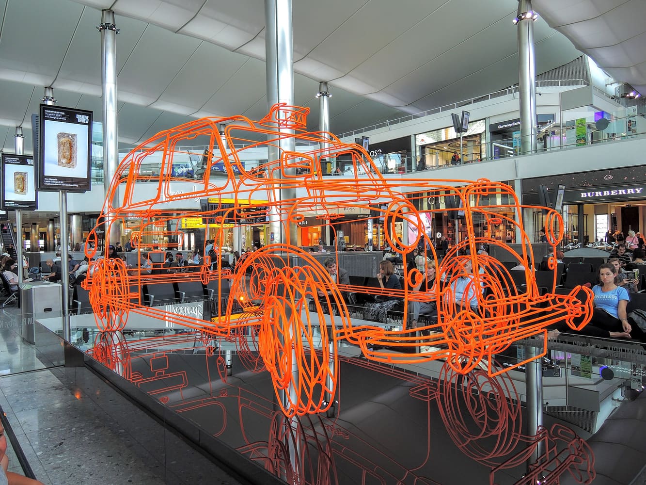 The wire-sculpture London taxi in the departures hall of Heathrow Terminal 2